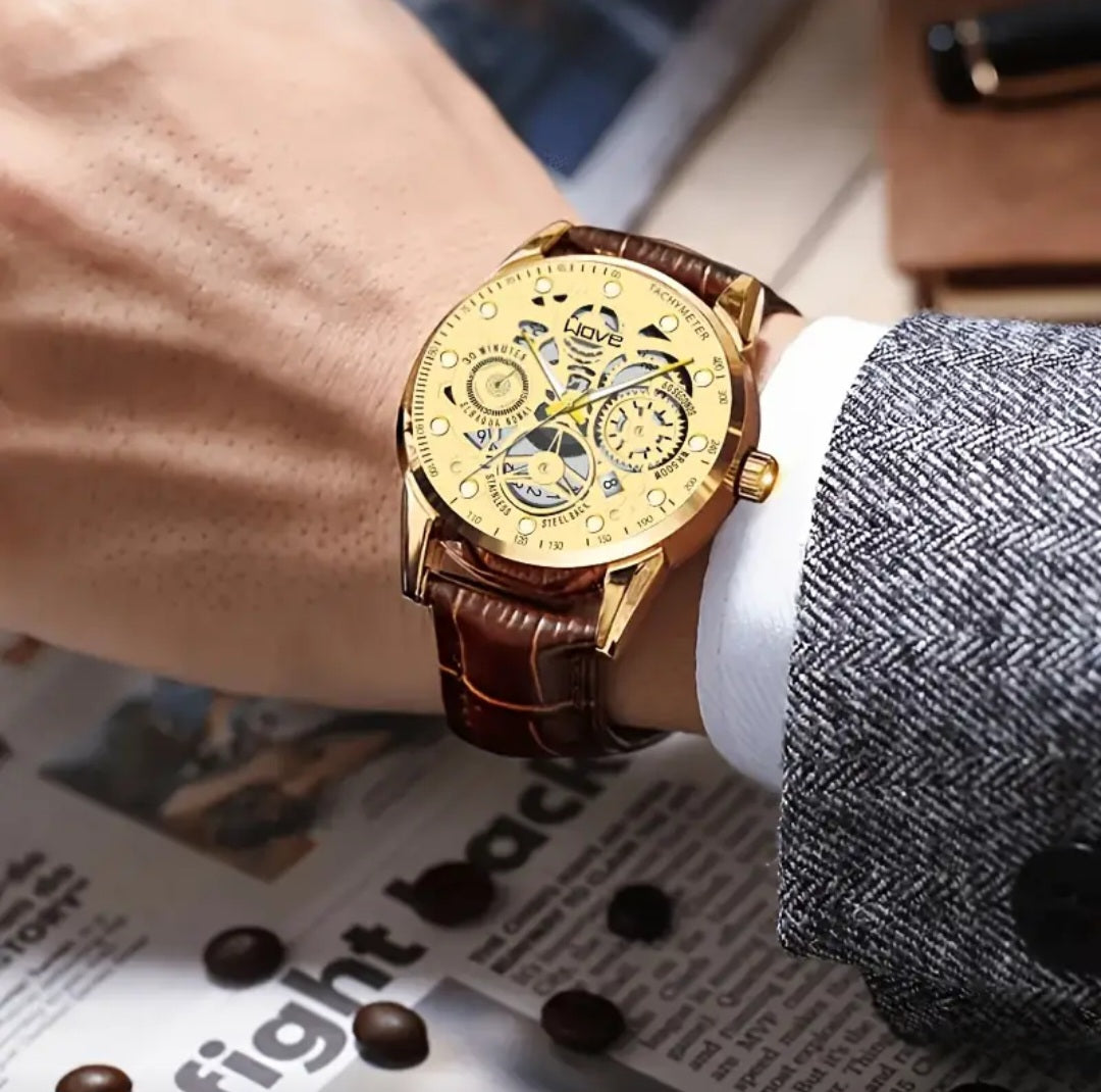 SKELTON GOLDEN TONE WAVE WATCH BLING8UK